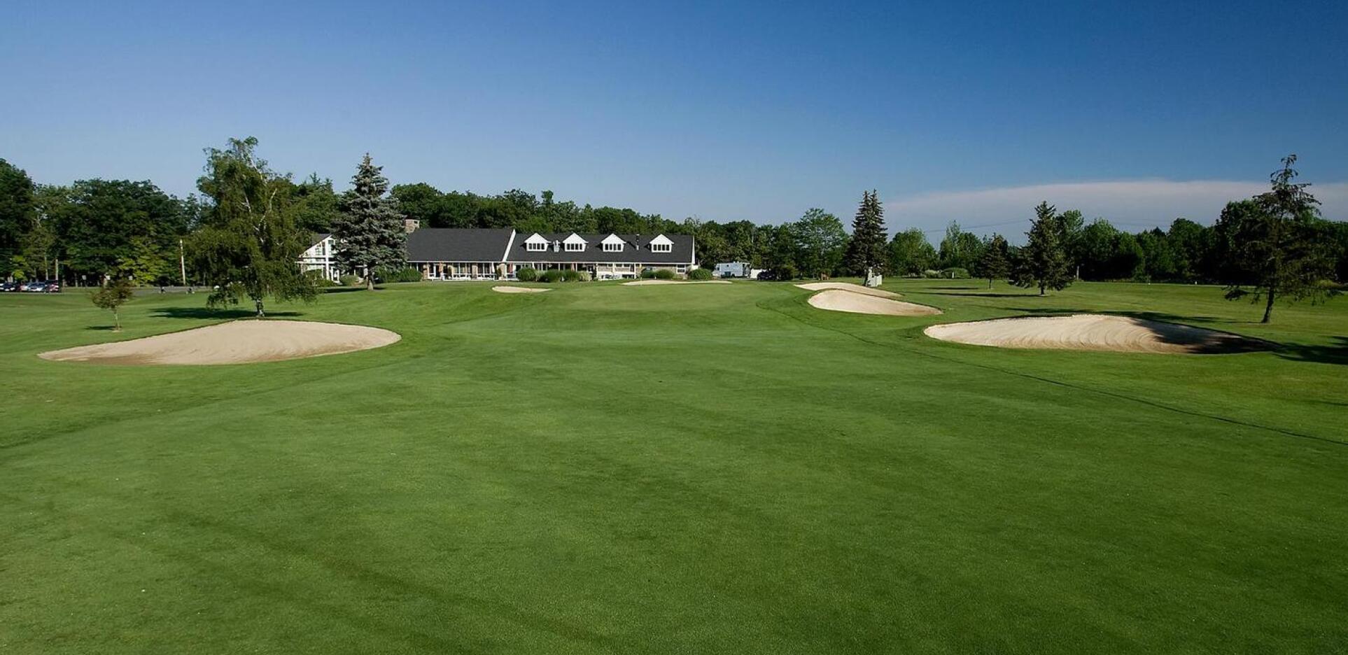 View of golf course fairway with bunkers